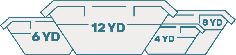 Workers next to segregated skips at a sustainable rubbish area in Staines