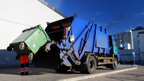 Construction site with waste clearance equipment in Staines