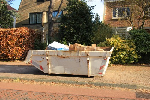 Properly loaded skip in a driveway